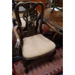 A pair of George I style elbow chairs