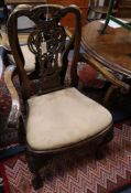 A pair of George I style elbow chairs