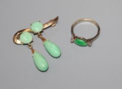 A yellow metal and jadeite set double drop brooch and a white metal, jadeite and diamond set three