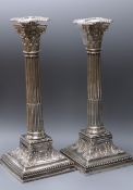 A pair of late Victorian silver corinthian column candlesticks, James Dixon & Sons, Sheffield,