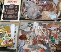 Minerals and rocks with reference books and a paeolithic arrowhead, etc.