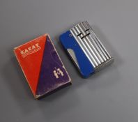 A World War II Karat lighter, boxed