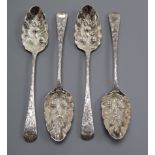 A set of four George III silver Old English pattern later decorated 'berry' spoons, Eley & Fearn,