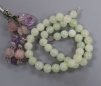 A Chinese carved amethyst quartz bead bracelet and a Chinese bowenite jade bead choker necklace