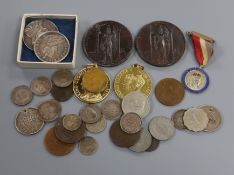 A collection of commemorative coins etc