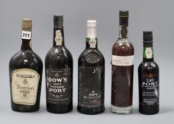 A bottle of Dow's 1963 vintage port and a bottle of Martinez Director's port and three other