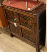 A polychrome decorated Tibetan cabinet W.78cm