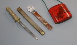 A Japanese lacquer inro, a mixed metal handle and a model of a wakasashi