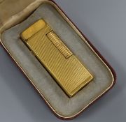 A Dunhill gold plated rollagas lighter