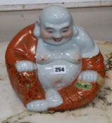 A Chinese ceramic buddha