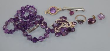 Seven items of mainly early 20th century amethyst set jewellery including ring, pendants and seed