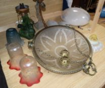 A French plaffonier, cranberry and other glass shades and tow Art Deco glass figural lamp bases