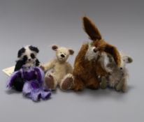 Five small artist toys: a mouse, two bears and two rabbits