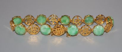 A Chinese 14k yellow metal, character link and cabochon jadeite set bracelet, approx. 18cm, gross