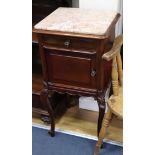 A late 19th century French mahogany and marble topped bedside cupboard W.42cm