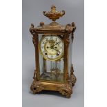 An early 20th century gilt metal four glass mantel clock 48cm high