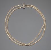 A double strand (ex triple strand) cultured pearl necklace, with 18ct & Pt, diamond set clasp,