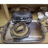 A Victorian silver plated two handled tea tray, a plated cover, two coaster frames, etc.