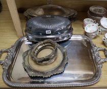 A Victorian silver plated two handled tea tray, a plated cover, two coaster frames, etc.