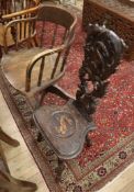 A Victorian carved oak spinning chair and a swivel desk chair (2)