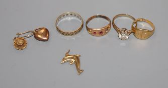 An 18ct gold signet ring, a 15ct gold and ruby gypsy-set ring (lacking one stone) and five other