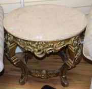 A low circular carved giltwood table, with a marble top W.72cm