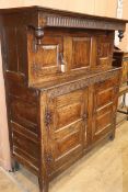 An oak court cupboard W.151cm