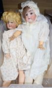 A Kestner bisque shoulder head doll with kid body and and Armand Marseille jointed bisque doll