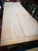 An oak refectory table W.237cm