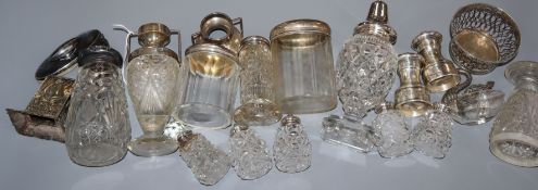 Mixed silver including bowl by William Comyns, pepper mill and silver topped bottles etc.