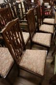 A set of 6 Edwardian mahogany dining chairs (2 with arms)
