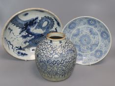 A Chinese blue and white deep plate decorated with a dragon and two other items