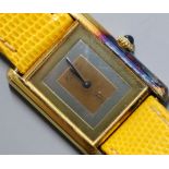 A lady's 925 gilt white metal Must de Cartier manual wind wrist watch.