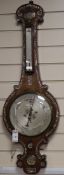 A Victorian mother of pearl inlaid rosewood wheel barometer by Butti and Son Edinburgh