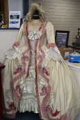 Countess Almaviva's costume for The Marriage of Figaro. A cream silk dress, under skirt, looped