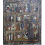 A late 19th century Eastern European icon, tempera on wood, decorated with scenes from the life of