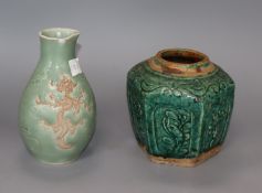 A Chinese Qing dynasty celadon glazed 'dragon and phoenix' bottle and a green glazed jar