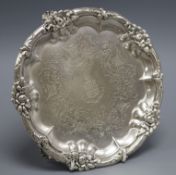 A Victorian silver waiter with rose and thistle border, crested, John & Henry Lias, London, 1844.