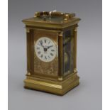 A Charles Frodsham brass repeating carriage clock