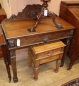 A carved oak green-man side table and similar smaller table W.91cm and 46cm