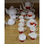 A collection of Wedgwood Susie Cooper Corn Poppy tableware and a blue spot teapot, milk jug and