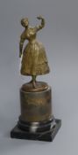 A small bronze of a dancing lady on a marble base H.17.5cm