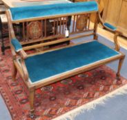 An Edwardian inlaid mahogany two seater settee W.118cm