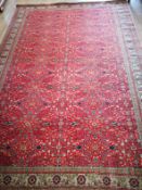 A Turkish Kayseri brick red rug 295 x 204cm