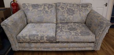 A modern upholstered cut velvet two seat sofa, no feet W.205cm