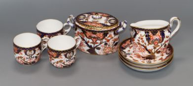 A Crown Derby eight piece part coffee set