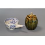 A 19th slipware money box and a blue and white pap boat