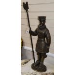 A novelty cast metal Beefeater lamp (lacking fitments) H.81cm