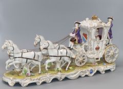 A Continental porcelain horse and carriage length 60cm