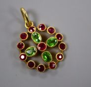 An early-mid 20th century yellow metal demantoid garnet and ruby cluster set openwork pendant,